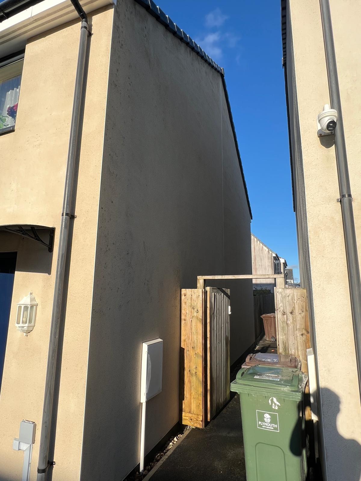 After: Side wall — heavy algae & lichen removed